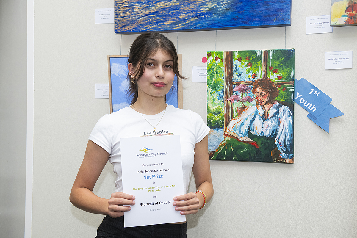 Photo of 2024 Women's Art Prize - Youth category winner Kaja Damodaran and painting 