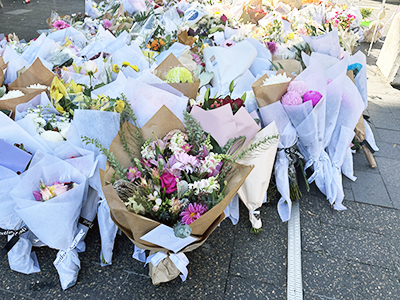 Flowers at Bondi Junction to pay tribute to victims of stabbing attack. 