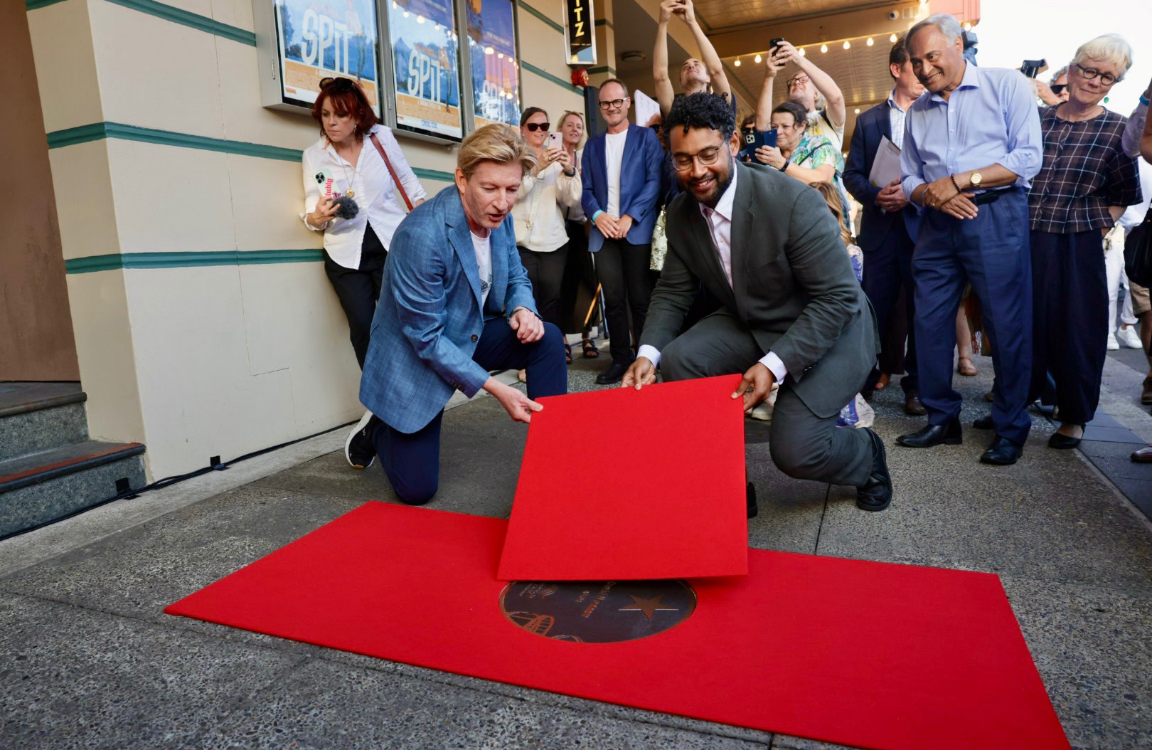 Actor David Wenham and Randwick Mayor Dylan Parker unveiling the plaque at a gala event at the Ritz Cinemas in Randwick.