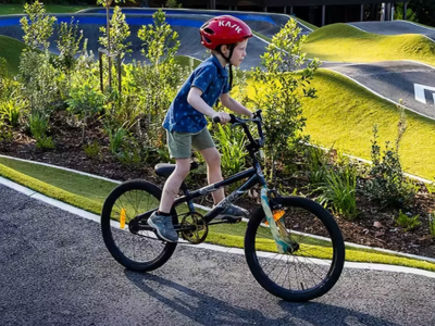 Child riding a bike at a pump park