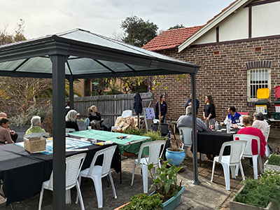Attendees of the Waste Education Workshop, gathered together outside