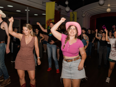 Line dancing attendees at Randwick Council's Rainbow Rodeo, part of Town Hall Takeover