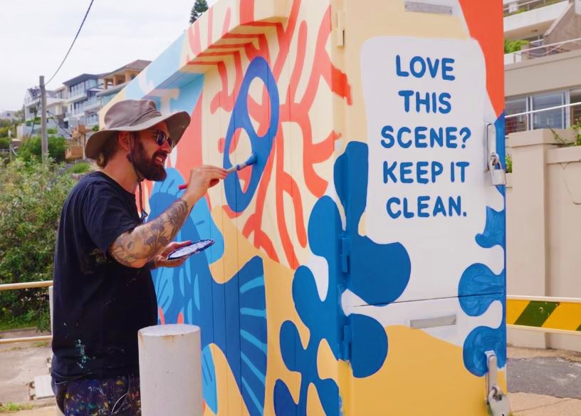 Artist Nico with Gordons Bay mural