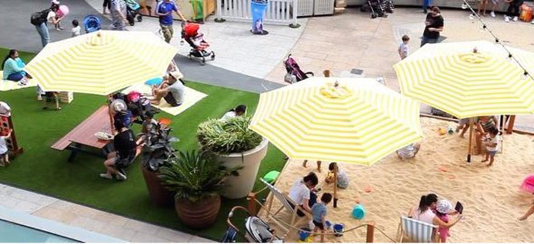 An example of a pop-up playground with a beach sandpit.