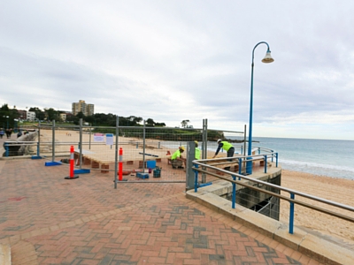 Construction of a temporary lifeguard office begins